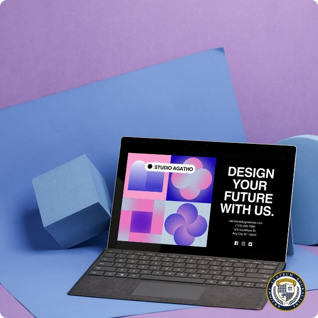 Laptop wyeksponowany na fioletowym tle, prezentujący na ekranie kolorowy projekt graficzny z logo „Studio Agatho” i hasłem „Design your future with us”, otoczony geometrycznymi klockami
