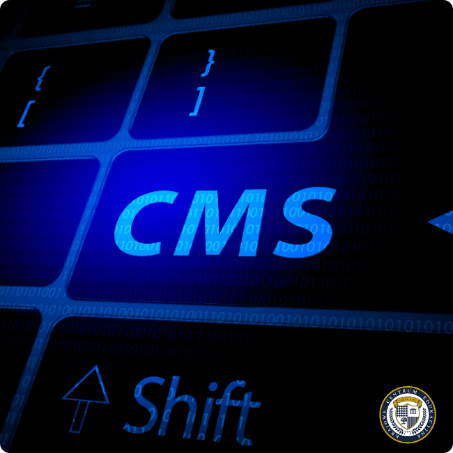 Zbliżenie na część klawiatury komputerowej w niebieskim podświetleniu, pokazujące przycisk CMS i klawisz Shift, z symbolami kodu w tle