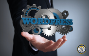 Osoba w garniturze trzymająca na dłoni mechanizm z trybami i niebieskim napisem WordPress - idealne zobrazowanie funkcjonalności wtyczek WordPress